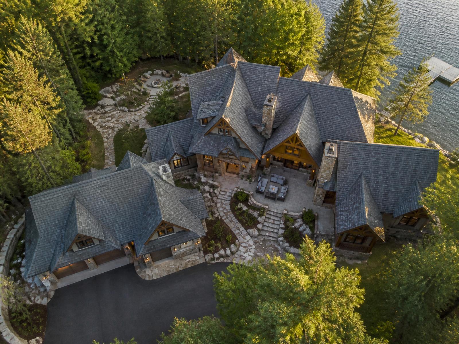 Aerial view of a completed architectural shingle roof in the Northwoods
